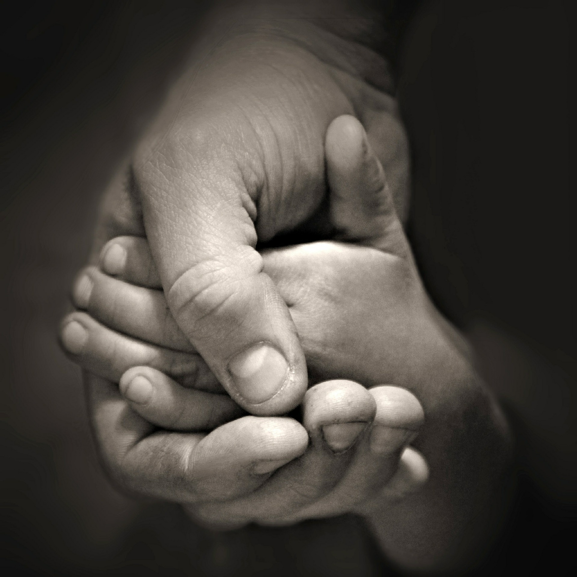 The father took his sons hand gently into his own, and they both went outside to play football.