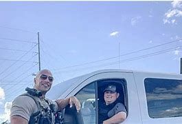 Morgan County deputy Lt. Eric Fields who looks like actor Dwayne Johnson Morgan County deputy Lt. Eric Fields who looks like actor Dwayne Johnson