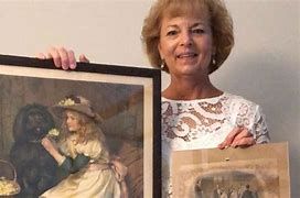 Irene Cornish and a painting that belonged to her great grandparents. Irene Cornish and a painting that belonged to her great grandparents.