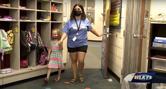 Kindergarten teacher Chene Hunt and student Fallen Coleman