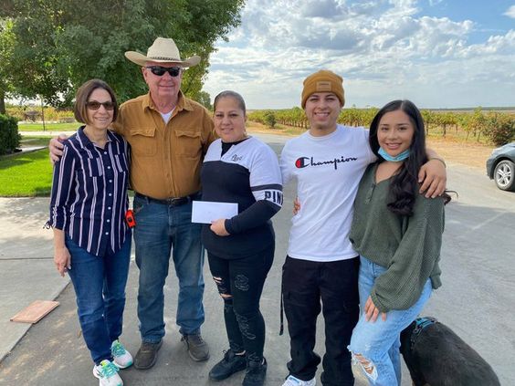 Dave Pechan (Cowboy hat) and the Cuevas family 