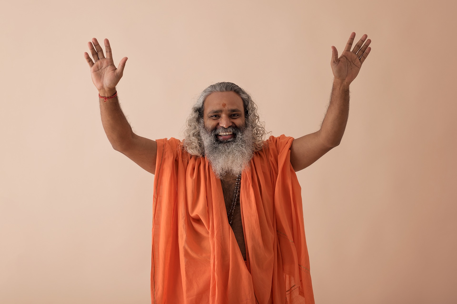 The Swami threw up his arms and laughed heartedly