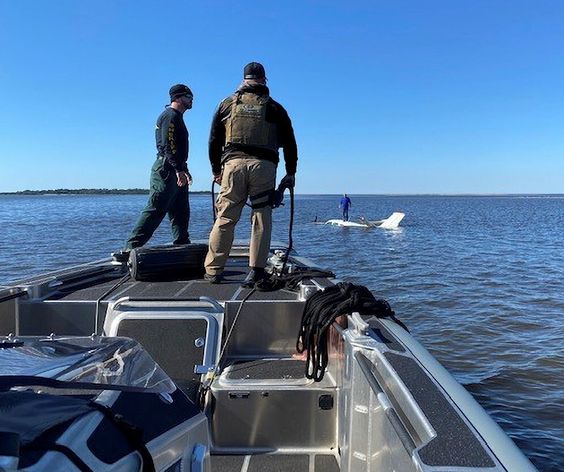 A deputy with the CCSO and a Tampa Marine Unit rescue a pilot from the ocean A deputy with the CCSO and a Tampa Marine Unit rescue a pilot from the ocean