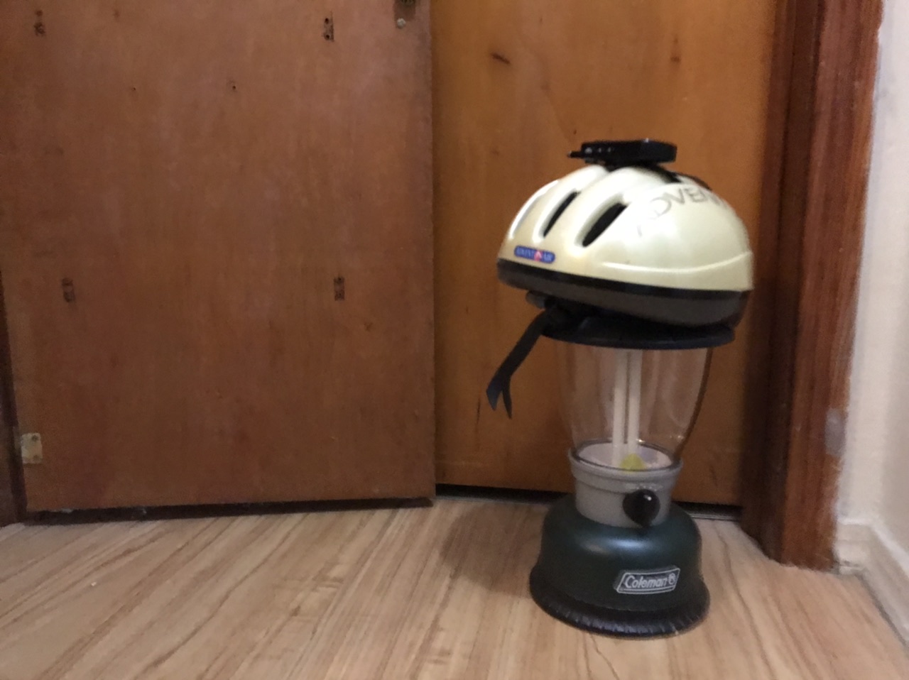 Weather radio, bike helmet, and battery lantern ready in safe place. Photo taken by and the property of FourWalls. Weather radio, bike helmet, and battery lantern ready in safe place. Photo taken by and the property of FourWalls.