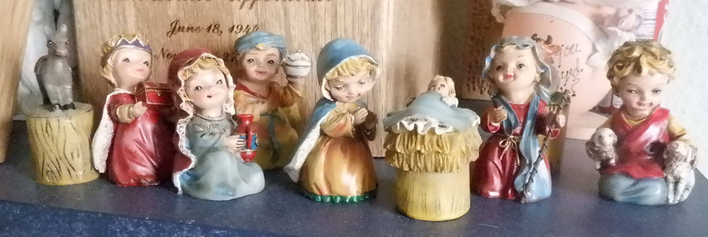 Photo I took of the thimble Nativity on the bookshelf Photo I took of the thimble Nativity on the bookshelf