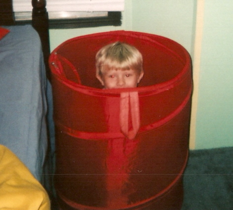 Gettin Caught - My son getting caught hiding in the hamper :)