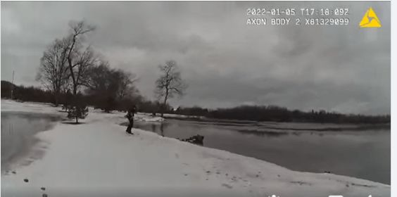 Lewiston Police Officer John Smith rescues a Black Lab from drowning in a lake Lewiston Police Officer John Smith rescues a Black Lab from drowning in a lake