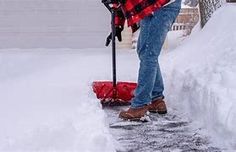 Bethel Park High School football players shoveling snow in their neighborhoods. Bethel Park High School football players shoveling snow in their neighborhoods.