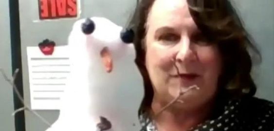 Florida Special Education school teacher Robin Hughes and a snowman.