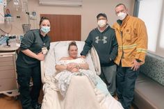 The ambulance team with mom Elizabeth and her daughter Nova in a hospital. The ambulance team with mom Elizabeth and her daughter Nova in a hospital.
