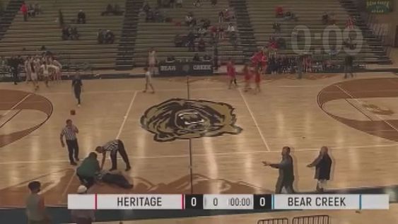 A girls high school basketball in game in Lakewood Colorado. A girls high school basketball in game in Lakewood Colorado.