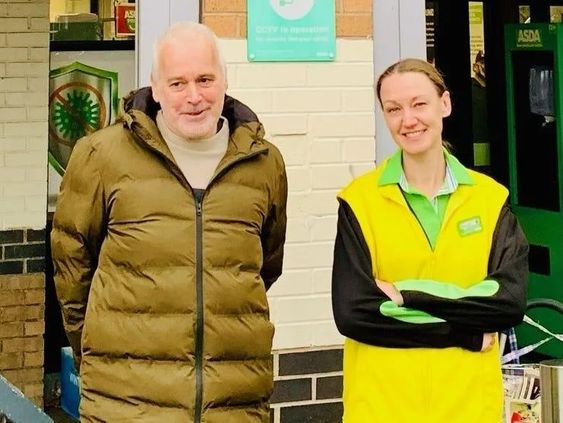 Nigel Gronous (L) and his savior Gayle Tomlinson outside of a supermarket Nigel Gronous (L) and his savior Gayle Tomlinson outside of a supermarket