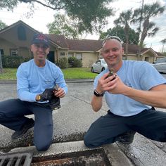 Two Orlando firefighters rescue ducklings trapped inside of a storm drain.