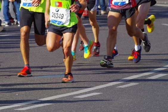 Marathon runners in a race somewhere. Marathon runners in a race somewhere.