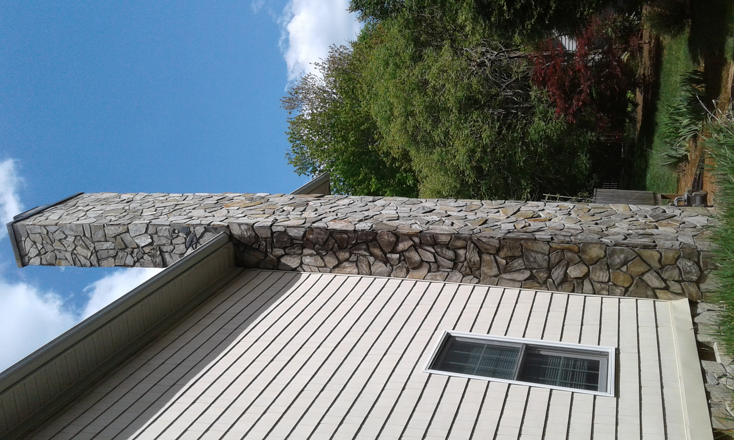 The stone on my chimney got a big crack in it, and the rain started getting in. Bad news. 