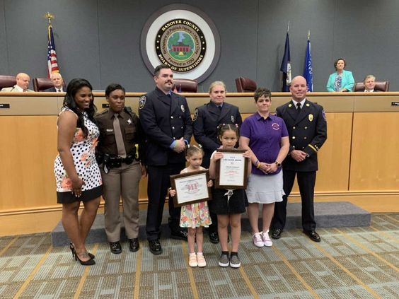 Hanover County officials award Jordynne Etheridge with an award. Hanover County officials award Jordynne Etheridge with an award.