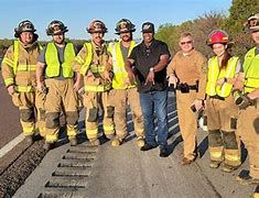 Former University of Oklahoma running back Marcus Dupree (4th from right) the hero Former University of Oklahoma running back Marcus Dupree (4th from right) the hero