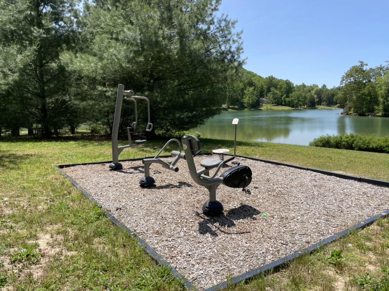 Exercise equipment next to the lake at Big Ridge State Park near Maynardville, Tennessee.  Photo taken by and the property of FourWalls.
