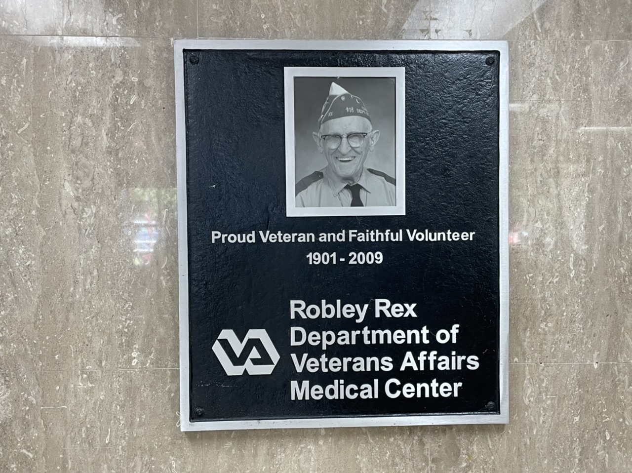 The plaque honoring Robley Rex at the VA hospital. Photo taken by and the property of FourWalls. The plaque honoring Robley Rex at the VA hospital. Photo taken by and the property of FourWalls.