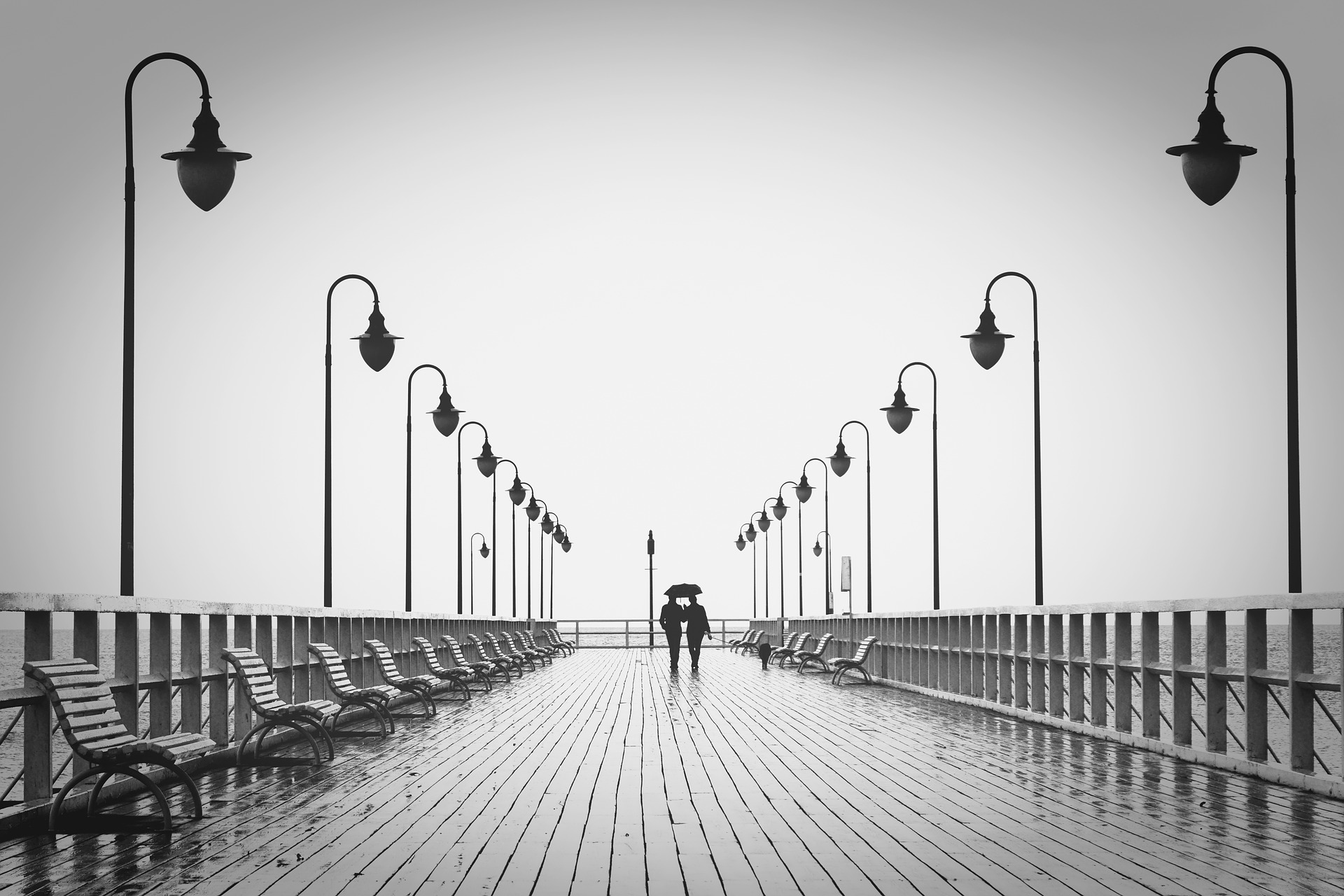 https://pixabay.com/photos/couple-boardwalk-silhouettes-walk-1783843/