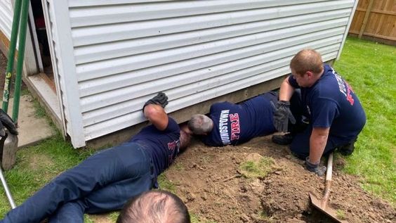 Youngstown Firefighters rescue a female dog trapped in the shed of a home. Youngstown Firefighters rescue a female dog trapped in the shed of a home.