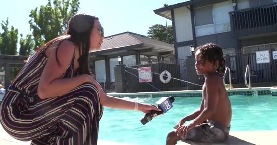 A news reporter in Sacramento interviewing Massiah Browne at poolside. A news reporter in Sacramento interviewing Massiah Browne at poolside.