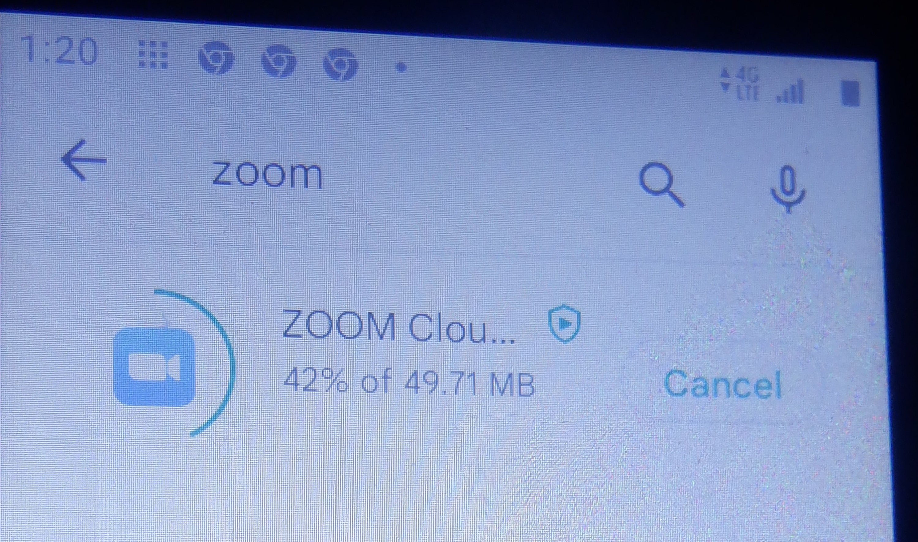 Photo I took of tmy phone downloading Zoom