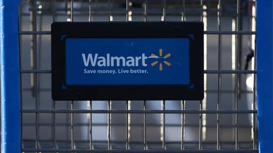 A cart with the Wal Mart logo. A cart with the Wal Mart logo.