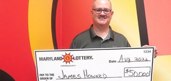 Maryland lottery winner James Howard with his winning lottery prize. Maryland lottery winner James Howard with his winning lottery prize.