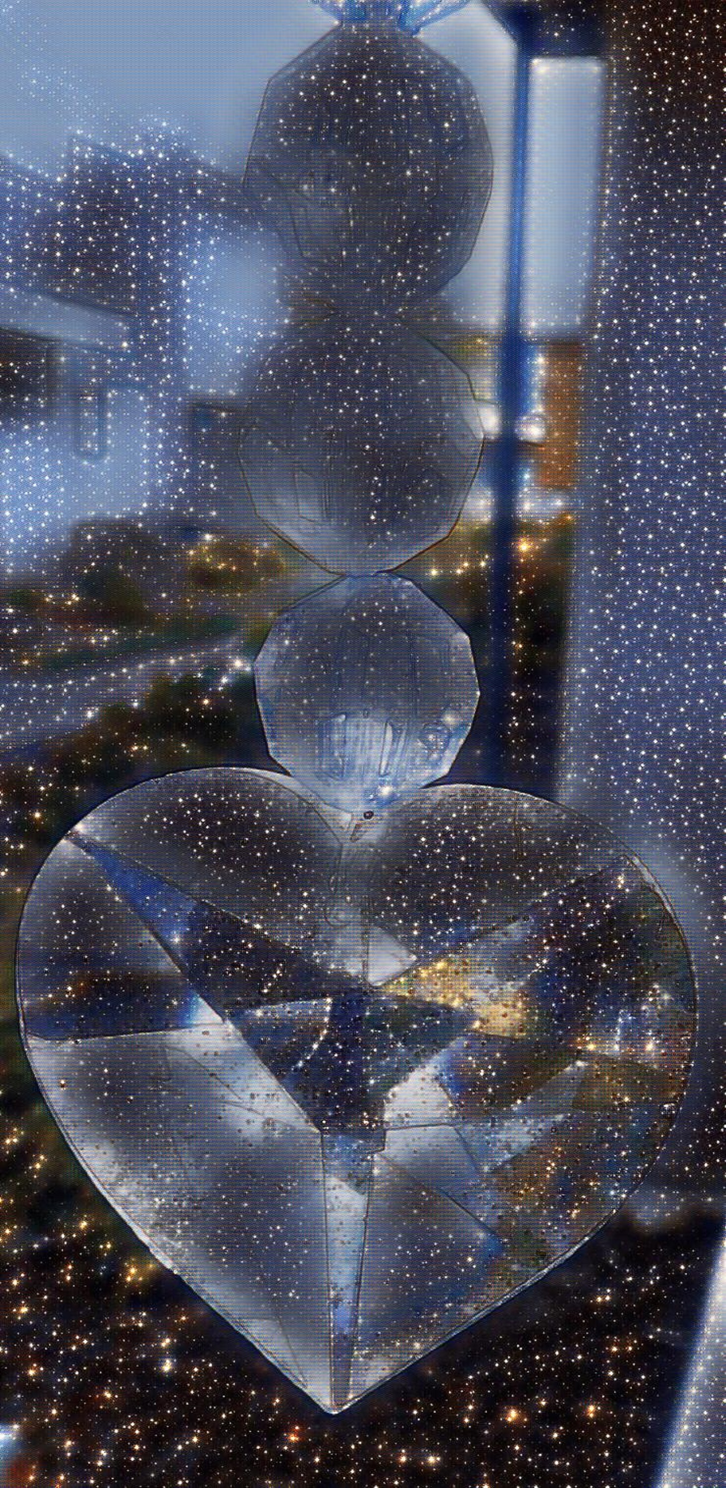 Heart on my windchime outside with Surreal and Space effects on LunaPic.com