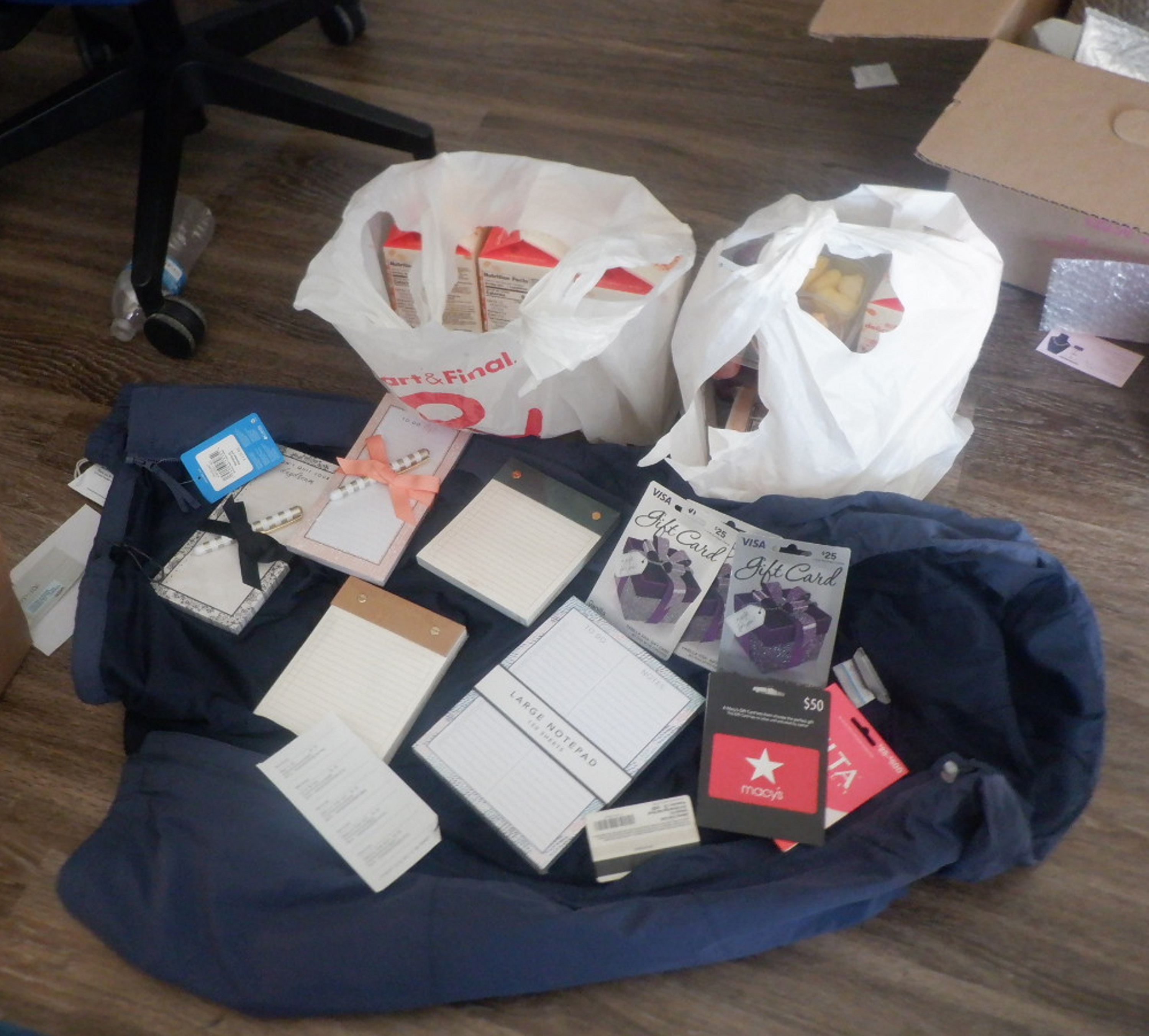 Photo I took of the coat, groceries, gift cards, and notepads that I got while I was out Photo I took of the coat, groceries, gift cards, and notepads that I got while I was out