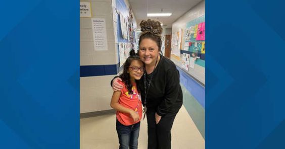 Willow Peoples on the left with her savior teacher Mrs. Torres in Akron Ohio  