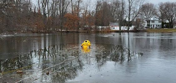 Rocky Hill Fire Department firefighters rescue a goose trapped on an icy pond. Rocky Hill Fire Department firefighters rescue a goose trapped on an icy pond.