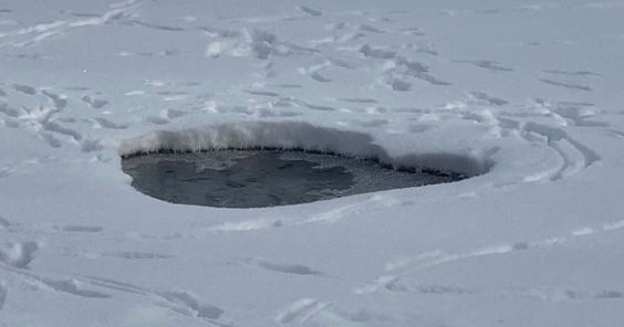 An icy river scene in West Fargo North Dakota where a dog fell down on Wednesday