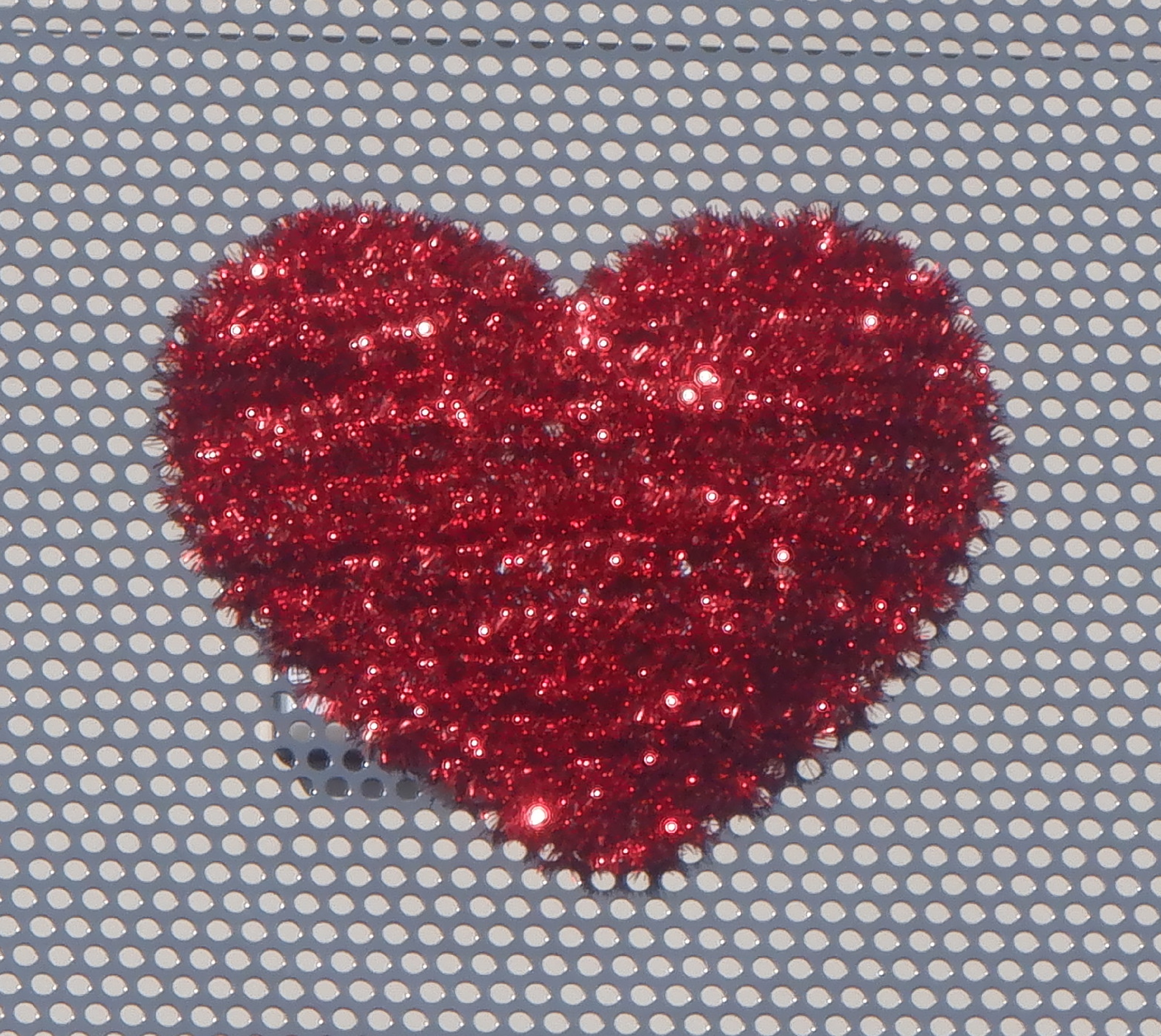 Photo I took of a heart decoration on the neighbor's patio wall Photo I took of a heart decoration on the neighbor's patio wall