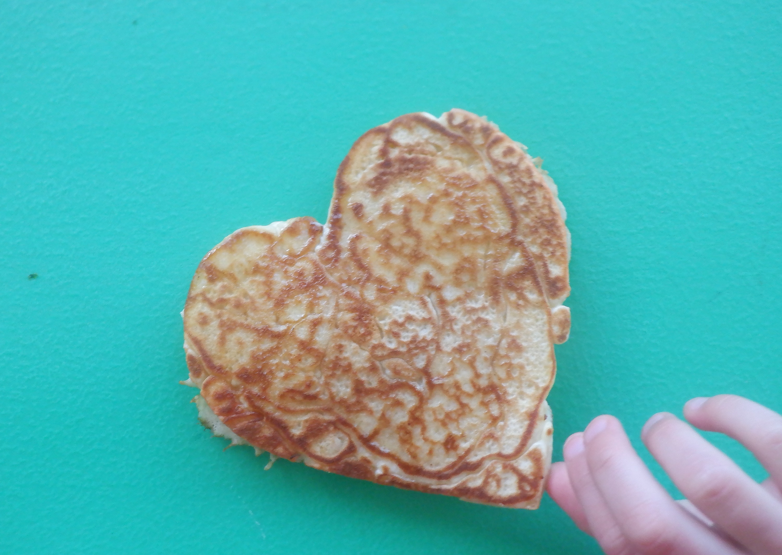 One of the heart pancakes my boss made for the kids for breakfast today One of the heart pancakes my boss made for the kids for breakfast today