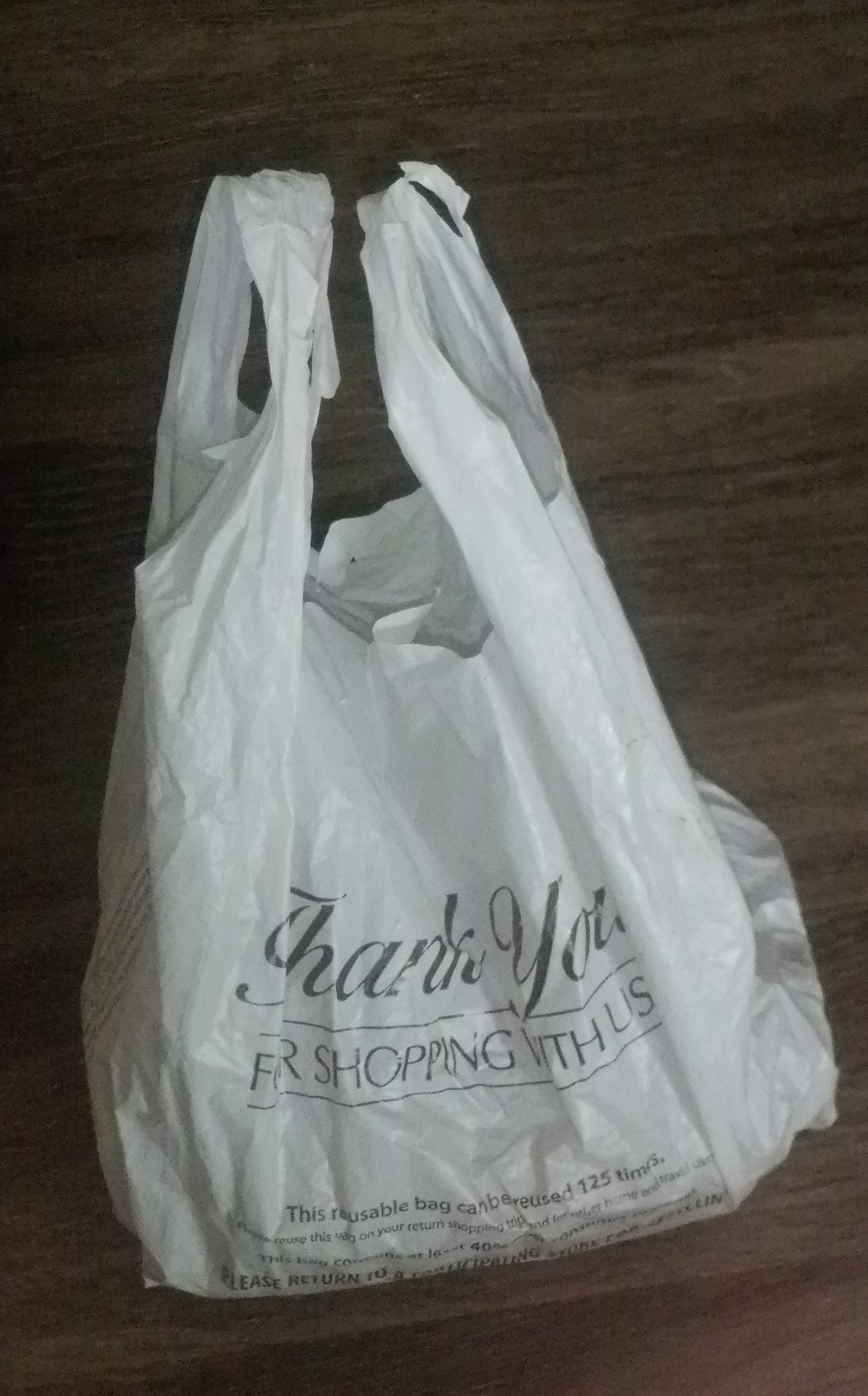 Shopping bag with two packages of chicken tenders in it for tonight Shopping bag with two packages of chicken tenders in it for tonight