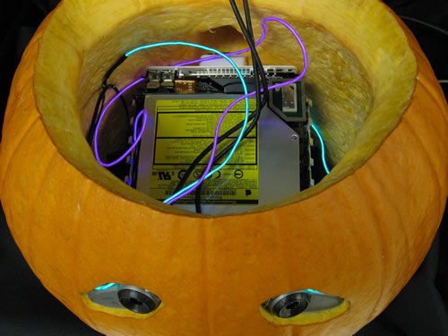 Making of Halloween - With the icky pumpkin innards cleared out, there's room enough for the Mac hardware.   Credit: University of Arkansas computer store staff