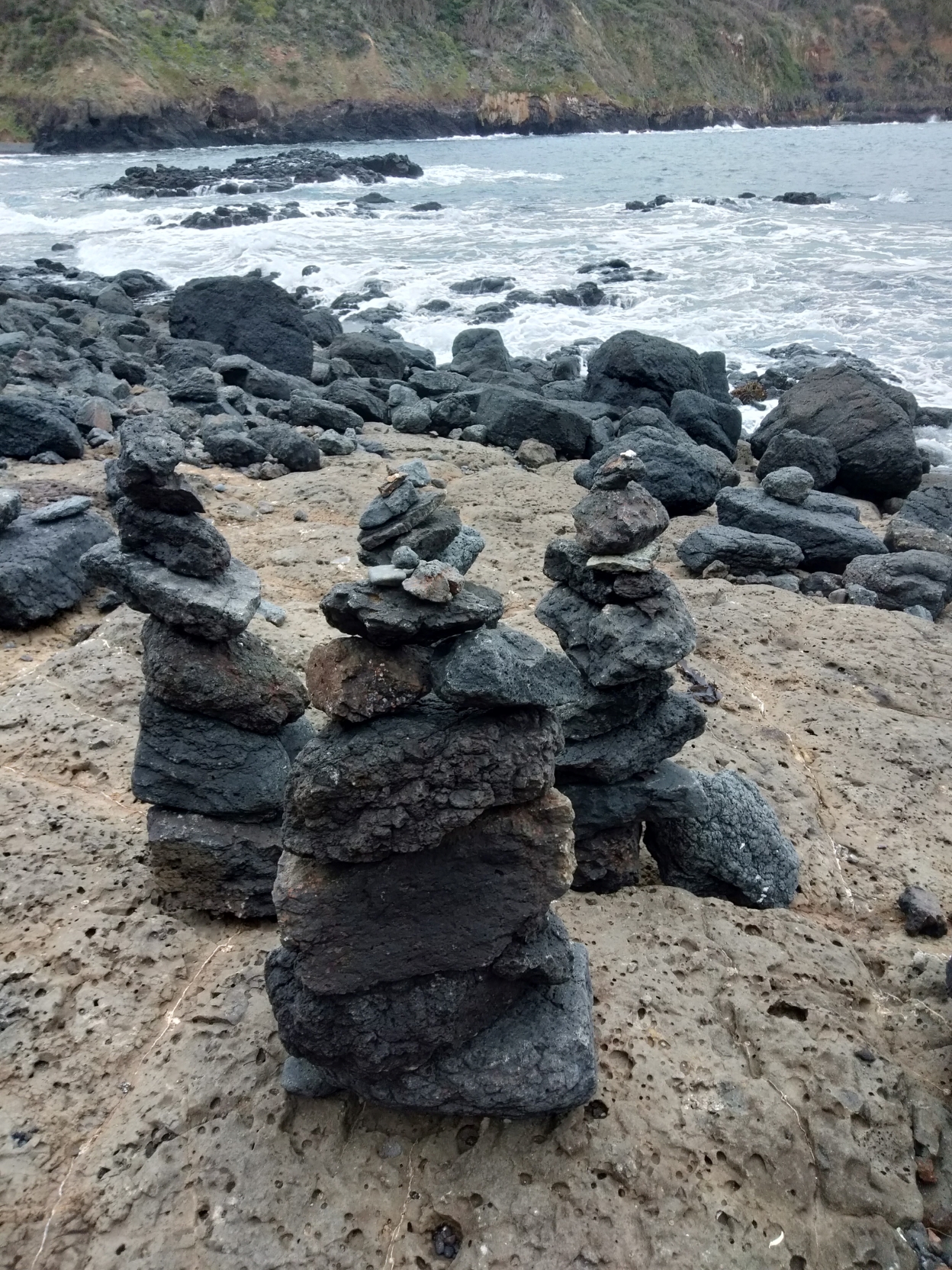 Piled rocks at a beach near me