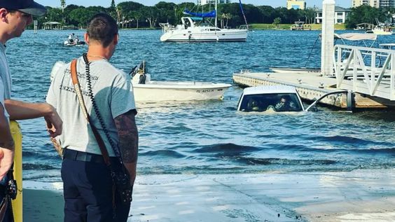 A pickup truck being taken out of the water at a boat ramp in Daytona Beach Florida A pickup truck being taken out of the water at a boat ramp in Daytona Beach Florida