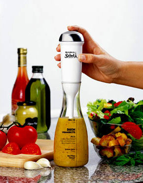 Mixer,  - This holiday season, people will venture into the kitchen and attempt great feats. But not everyone has a knack for the culinary arts. Luckily, there are countless gizmos on the market today that can make cooking a breeze. Here are some of our favorites.   This salad dressing mixer isn't all that different from the handheld mixers that have been around for years. But the 12-oz carafe it comes with is its coolest feature. The carafe comes with fill lines and ingredients for common dressings printed on the side, forgoing the need for measuring cups. The battery-powered mixer is fitted so chefs can emulsify dressings right in the carafe they serve from. It also comes with an air-tight lid for easy storage of leftover dressing.