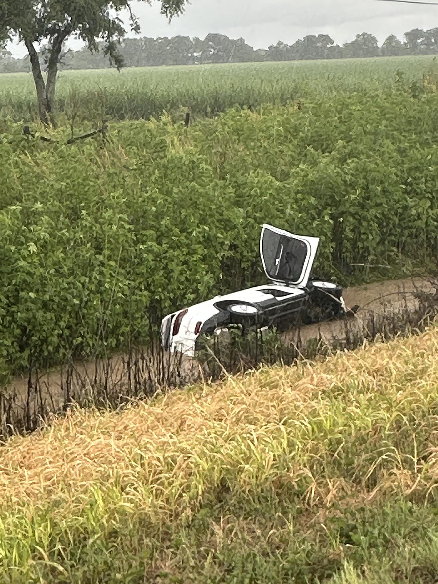 Image of an auto in a ditch in Louisiana Image of an auto in a ditch in Louisiana
