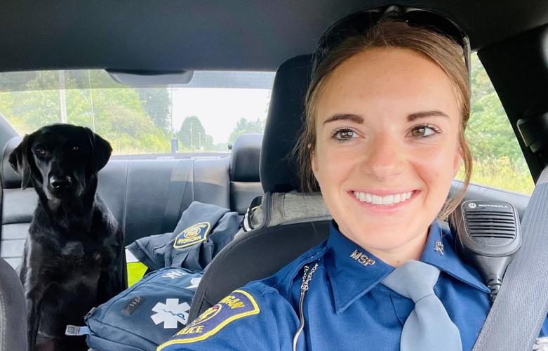 Officer Moore and her new dog Rosie