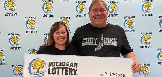 A Michigan couple happy that they won a huge jackpot in the lottery.