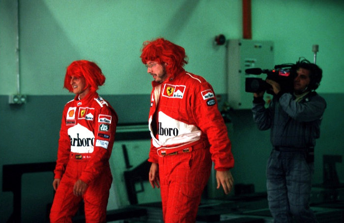 Funny! - Michael Schumacher and Brown wearing red hair in the pit! So funny pic!