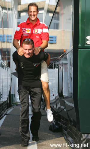 Michael Schumacher and DC - Michael Schumacher and DC in the pit. Cute!