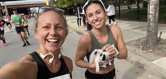 Gia with Sarah Bohan (Right) with a kitten that she rescued during a race Gia with Sarah Bohan (Right) with a kitten that she rescued during a race
