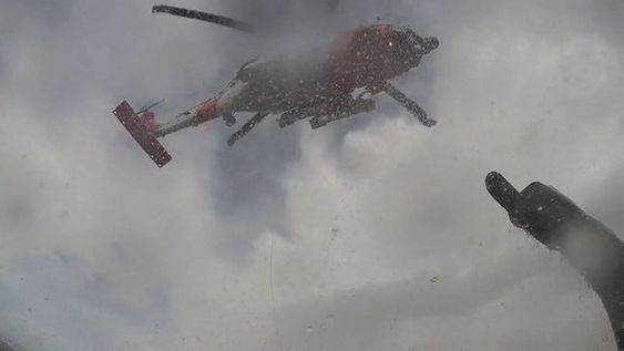 A USCG helicopter to the rescue of two passengers in Washington state. A USCG helicopter to the rescue of two passengers in Washington state.