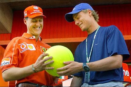 Huge tennis in Schumacher's hand - So big tennis ball!