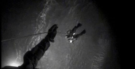 A USCG helicopter to the rescue of a sailor aboard a sailboat that took on water. A USCG helicopter to the rescue of a sailor aboard a sailboat that took on water.